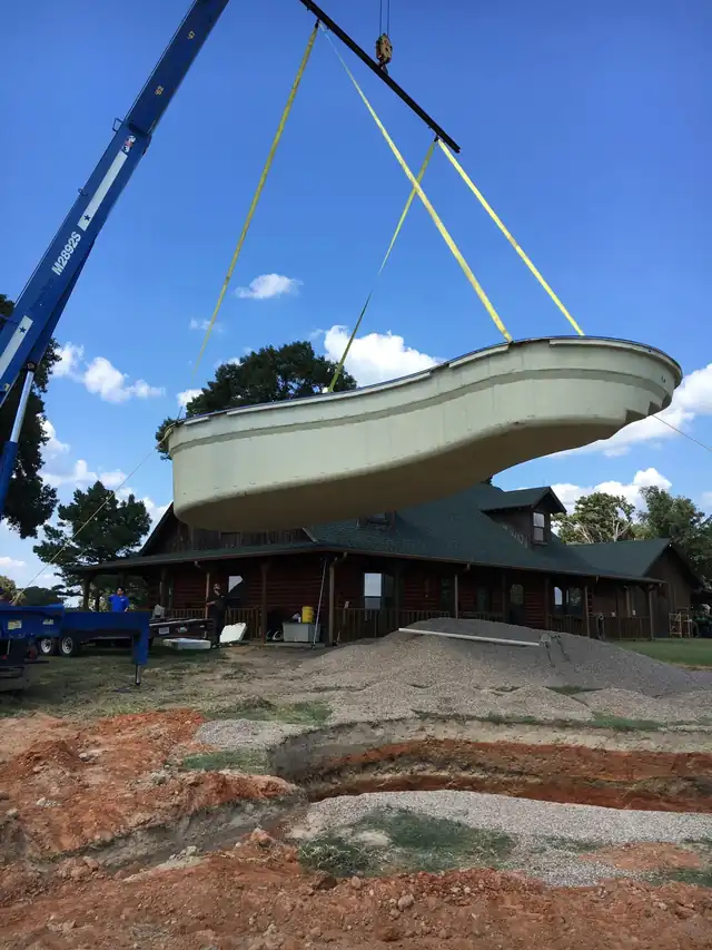 A fiberglass shell on the crane